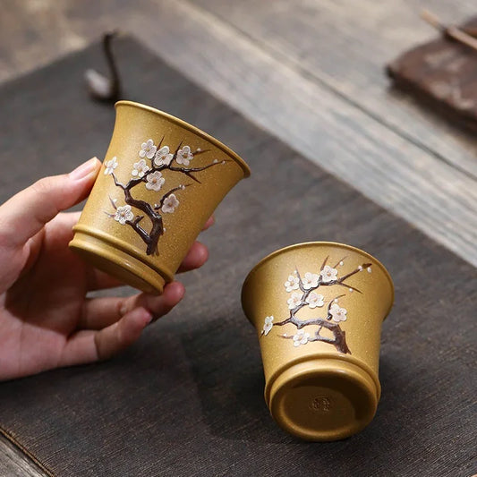 yixing-zisha-master-tea-cup-plum-blossom-100ml-color-change-by-temperature-yiqin-tea-house-yiqinteahouse-com-2 - YIQIN TEA HOUSE 一沁茶舍 yiqinteahouse.com