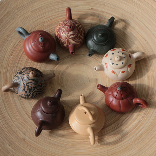 How the zisha artists make a Yixing zisha teapot?