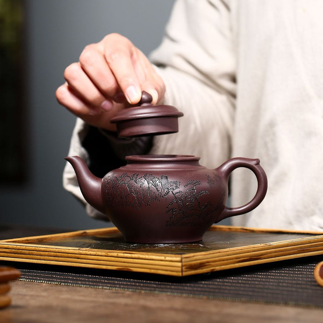 Yixing Zisha Teapot [Shanshui Xiao Ying 清韵山水笑樱] (Zi Ni - 290ml)