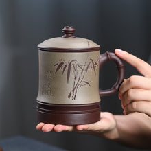 Load image into Gallery viewer, Handmade Yixing Zisha Tea Mug with Filter [Zui Chunfeng Zhu Jie] | 手工宜兴紫砂 手工刻绘 [醉春风竹节] (带茶滤/茶水分离) 盖杯
