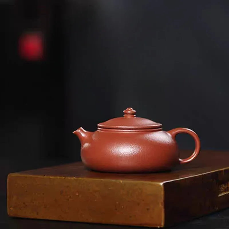 宜兴紫砂茶壶[寒江] (粗砂红降坡- 150ml)