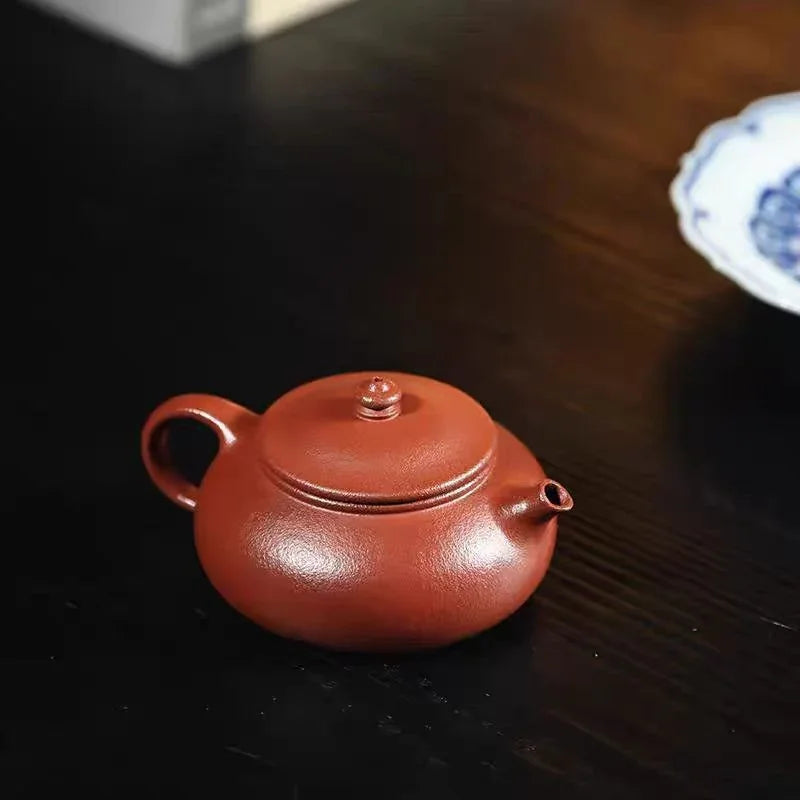 宜兴紫砂茶壶[寒江] (粗砂红降坡- 150ml)