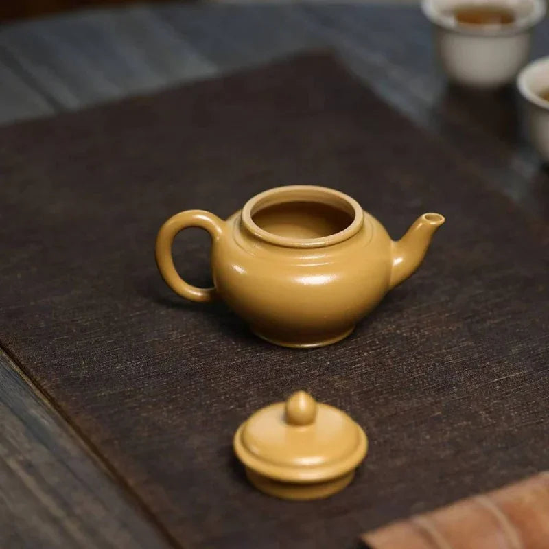 Théière Yixing Zisha [Mini Pot Xiao Ying] (Huangjin Zhu Ni - 110 ml)