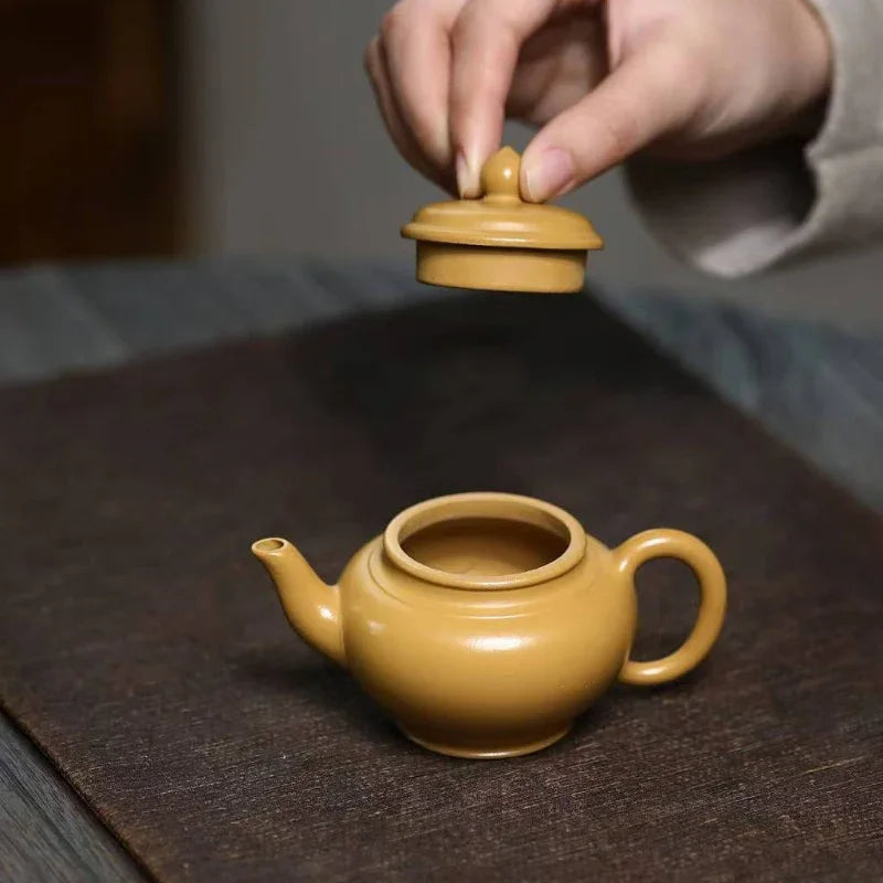 Théière Yixing Zisha [Mini Pot Xiao Ying] (Huangjin Zhu Ni - 110 ml)