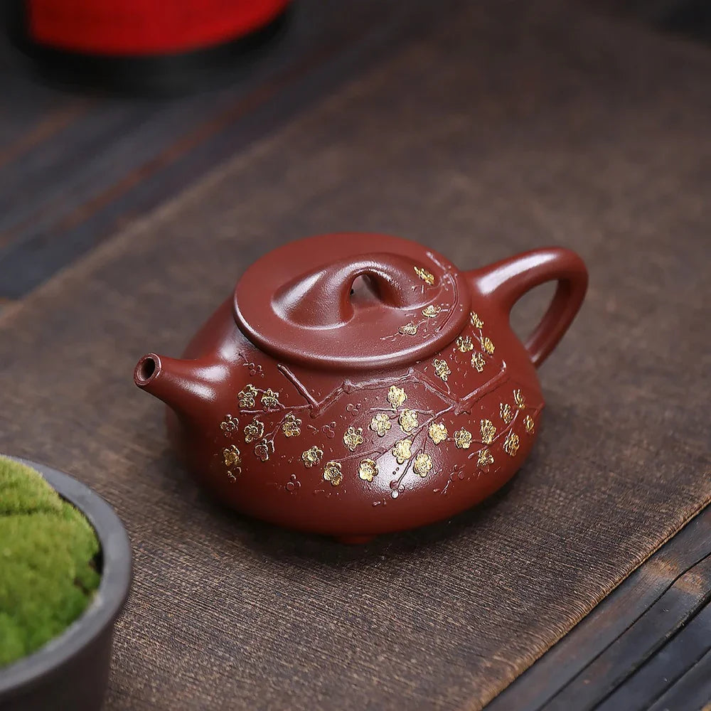 Théière Yixing Zisha [Fleur de prunier Jingzhou Shi Piao] (Hong Pi Long - 310 ml)