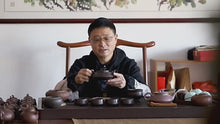Load and play video in Gallery viewer, Full Handmade Yixing Zisha Teapot [Cheng Feng Po Lang] 1 Pot 5 Cups Set (Lao Zi Ni - 320ml)
