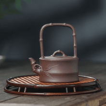Load image into Gallery viewer, Yixing Purple Clay Teapot [Bamboo Handle] | 宜兴紫砂壶 原矿紫泥 [竹节提梁] - YIQIN TEA HOUSE 一沁茶舍  |  yiqinteahouse.com
