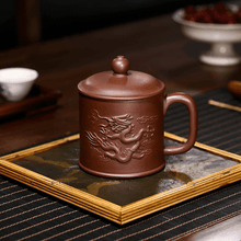 Load image into Gallery viewer, Yixing Purple Clay Tea Mug [Flying Dragon] | 宜兴紫砂刻绘 [龙飞九天] - YIQIN TEA HOUSE 一沁茶舍  |  yiqinteahouse.com

